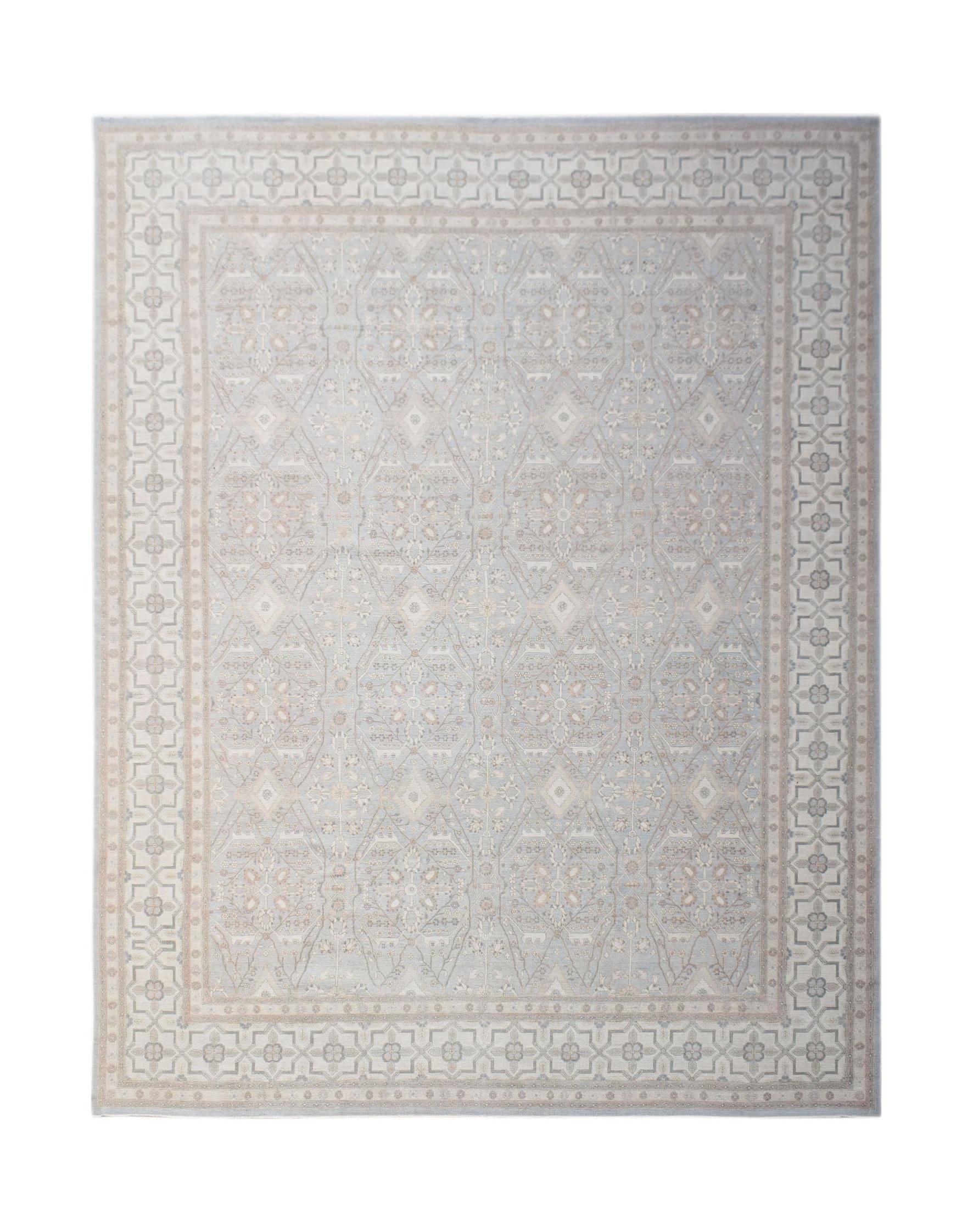 A handwoven Afghan Balkh rug featuring a traditional geometric pattern in soft blue and beige tones.