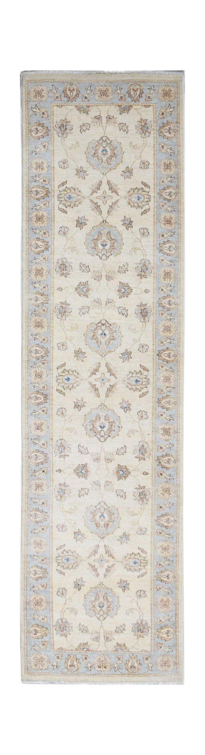 An Afghan Chobi runner rug featuring a traditional floral pattern in soft blue and beige tones.