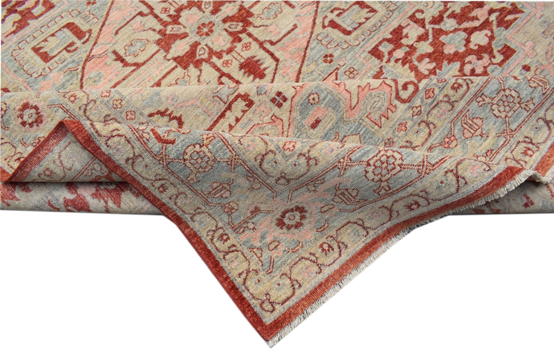 A handwoven Afghan Chobi rug featuring a traditional Heriz pattern in red, blue, and beige tones.