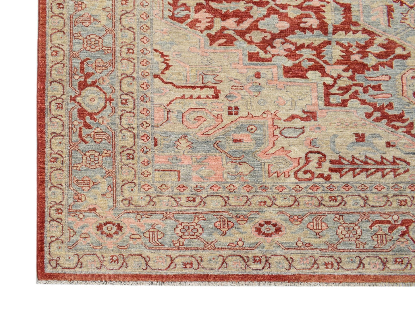 A handwoven Afghan Chobi rug featuring a traditional Heriz pattern in red, blue, and beige tones.