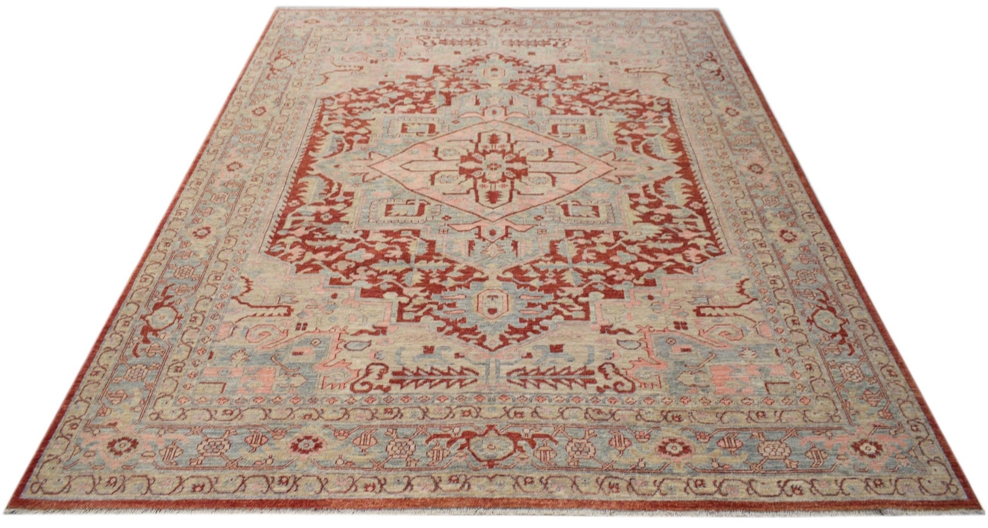 A handwoven Afghan Chobi rug featuring a traditional Heriz pattern in red, blue, and beige tones.