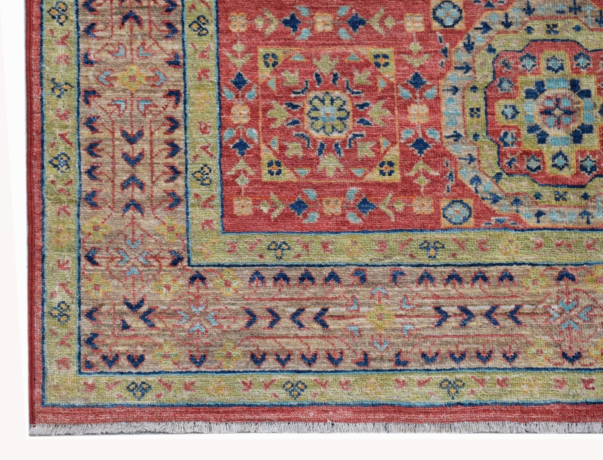 Handwoven Afghan Chobi rug featuring a traditional Mamluk medallion pattern in red and blue tones.