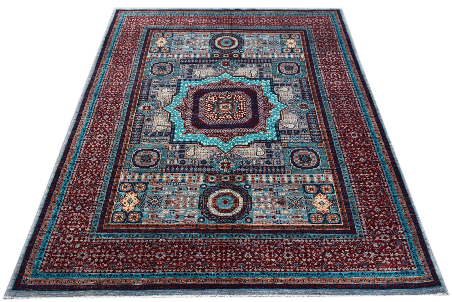 Handwoven Afghan Chobi rug featuring a detailed Mamluk medallion pattern in red and blue tones.