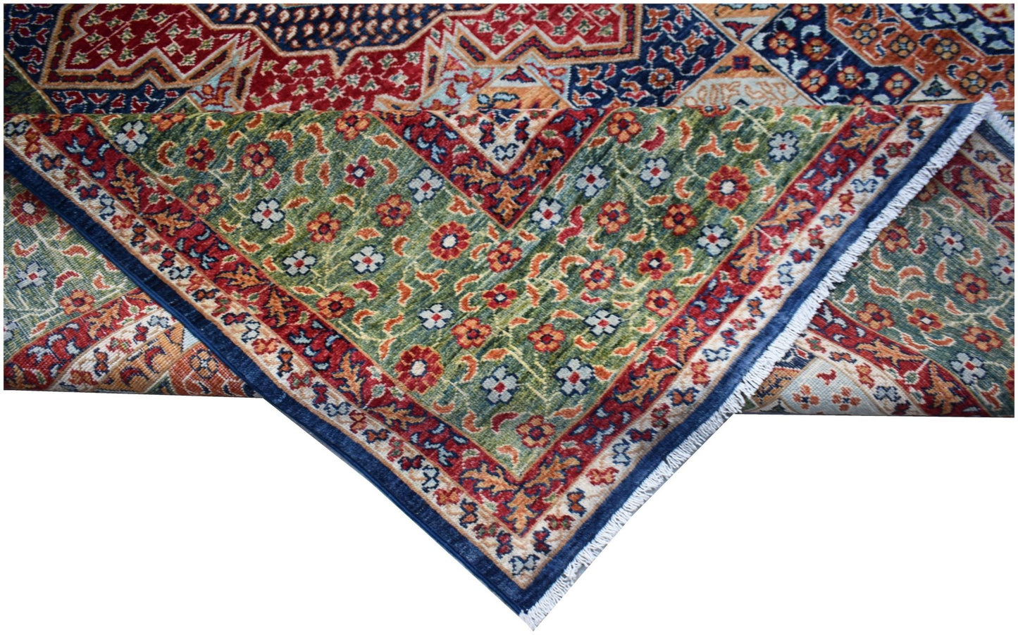 A handwoven Afghan Chobi rug featuring a complex Mamluk pattern in green, red, and blue tones.