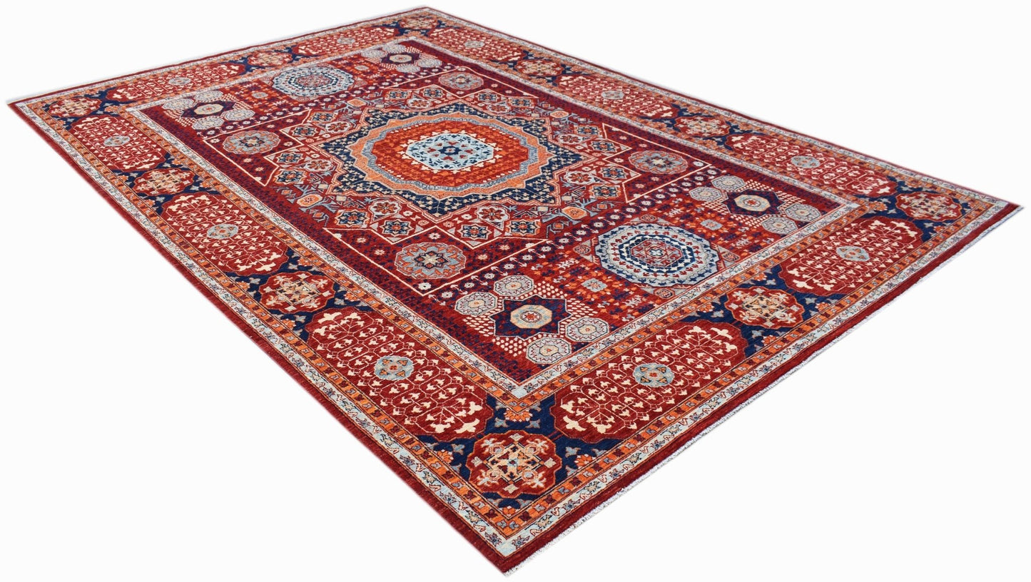 A rectangular handmade Afghan Chobi rug featuring a traditional Mamluk medallion pattern in red and blue.