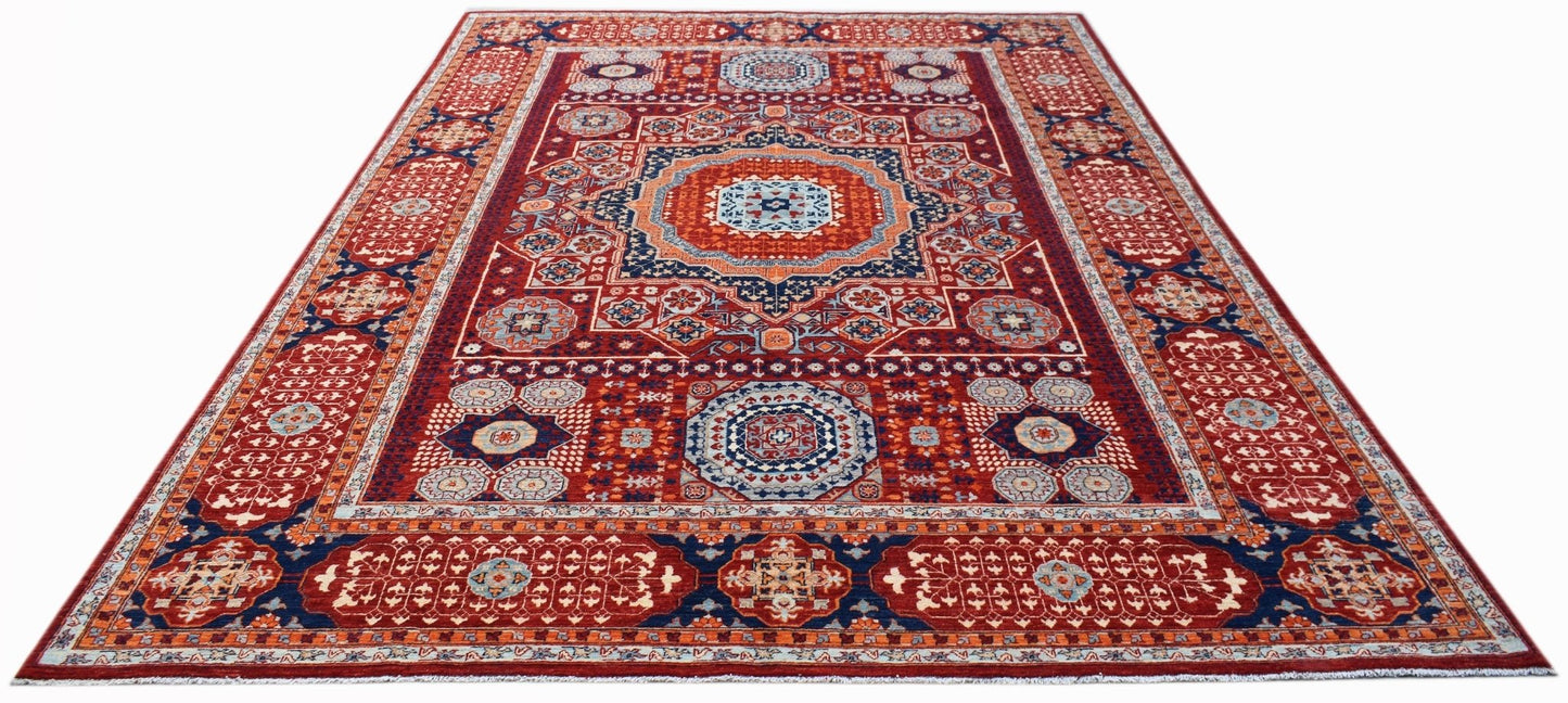 Handwoven Afghan Chobi rug featuring a traditional Mamluk medallion pattern in red and blue.
