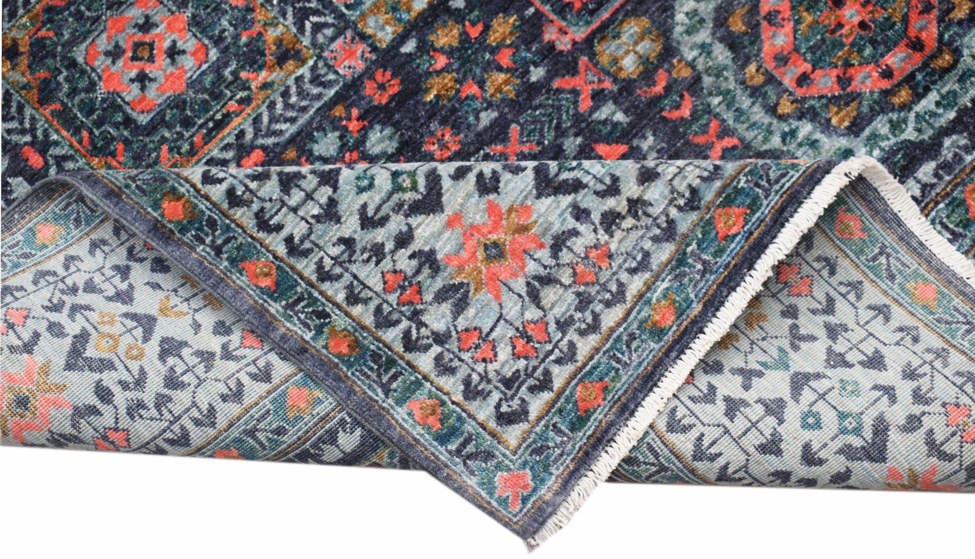 A handmade Afghan Chobi rug with a detailed Mamluk pattern in blue, red, and gold tones.