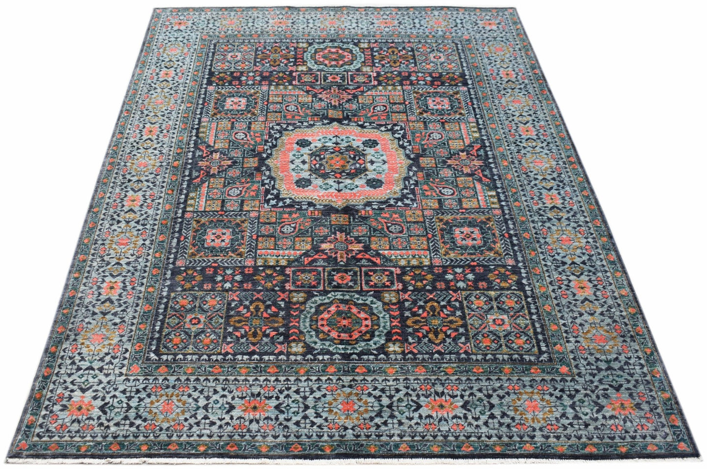 A rectangular Afghan Chobi rug featuring a detailed Mamluk medallion pattern in blue and coral.