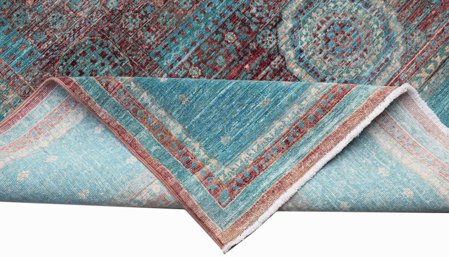 A handmade Afghan Balkh rug with a Mamluk pattern in shades of teal and deep red.