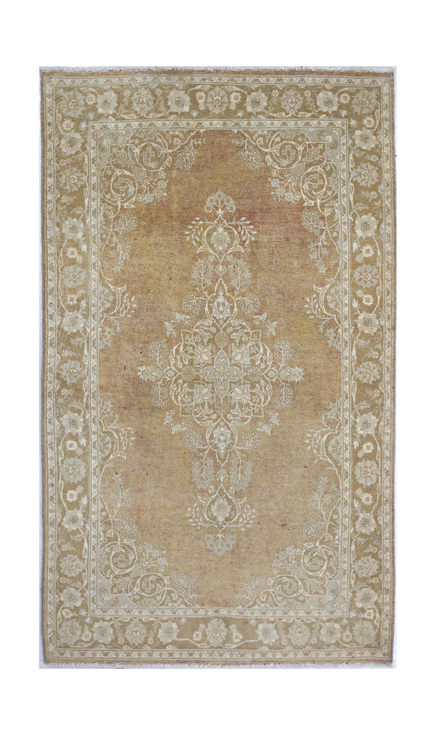 A rectangular Afghan Chobi rug featuring a traditional floral medallion in shades of tan and cream.