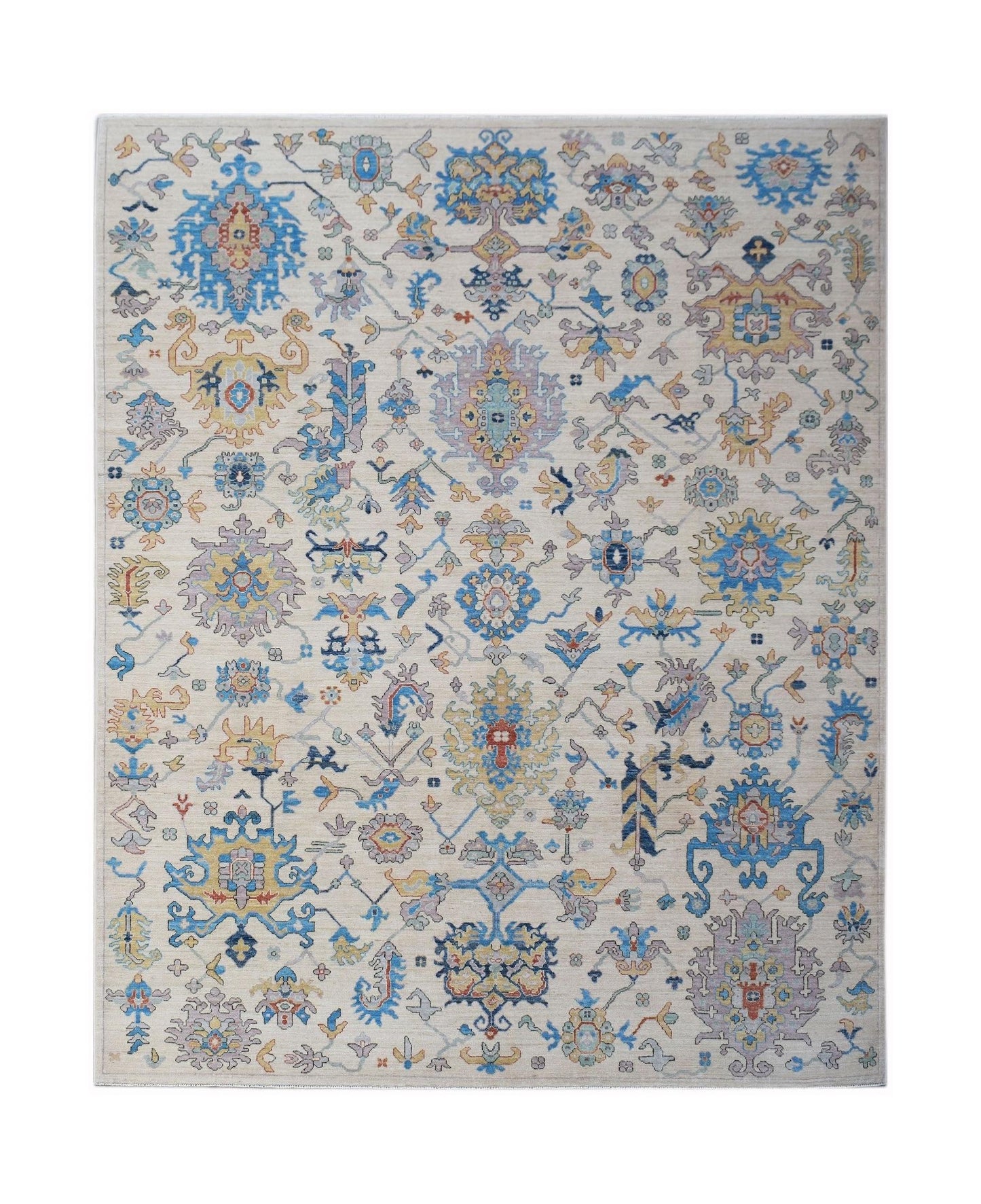 Handmade Afghan Chobi rug featuring a traditional floral pattern in blue, yellow, and cream tones.