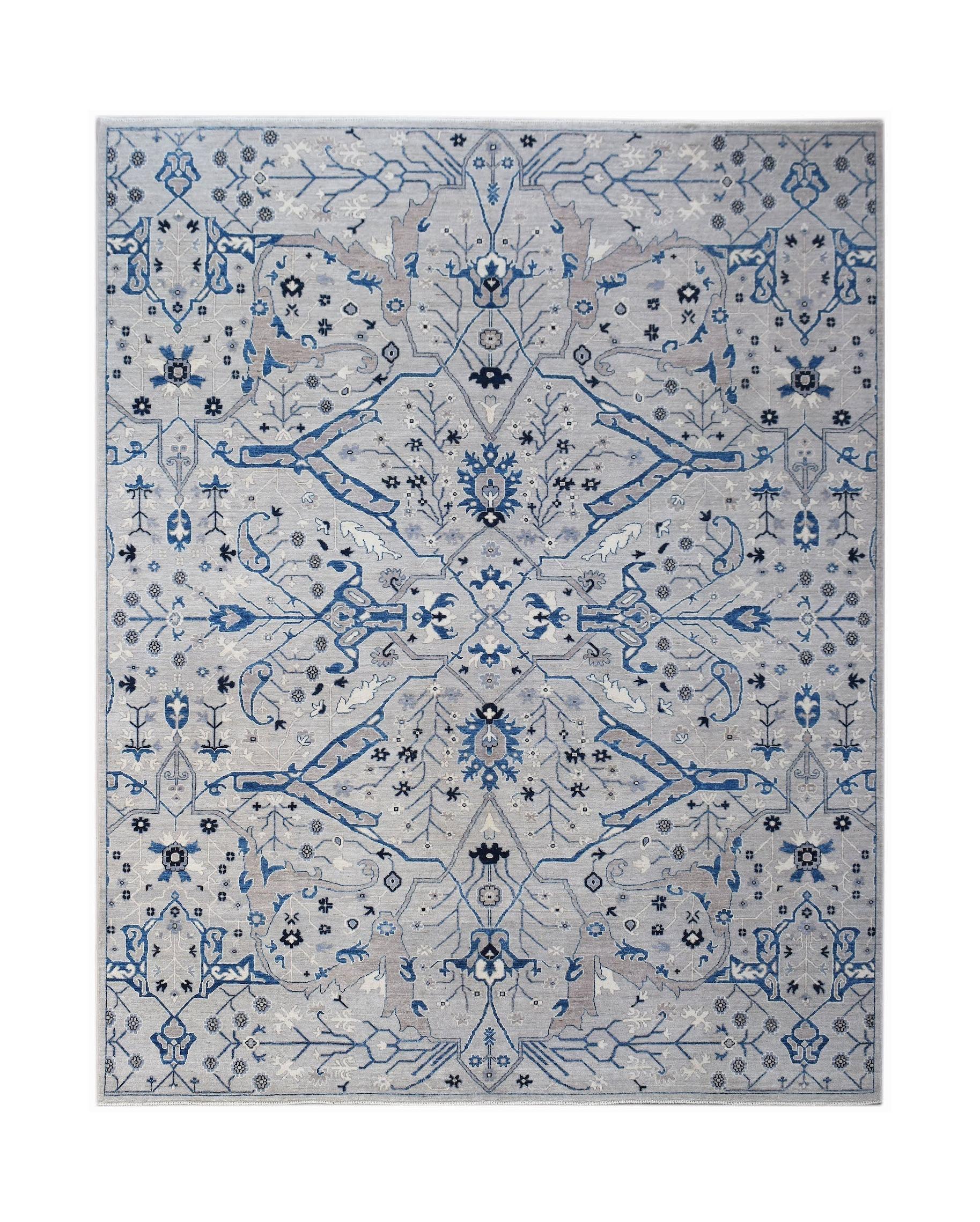A rectangular Afghan Chobi rug featuring a traditional blue and grey floral pattern.