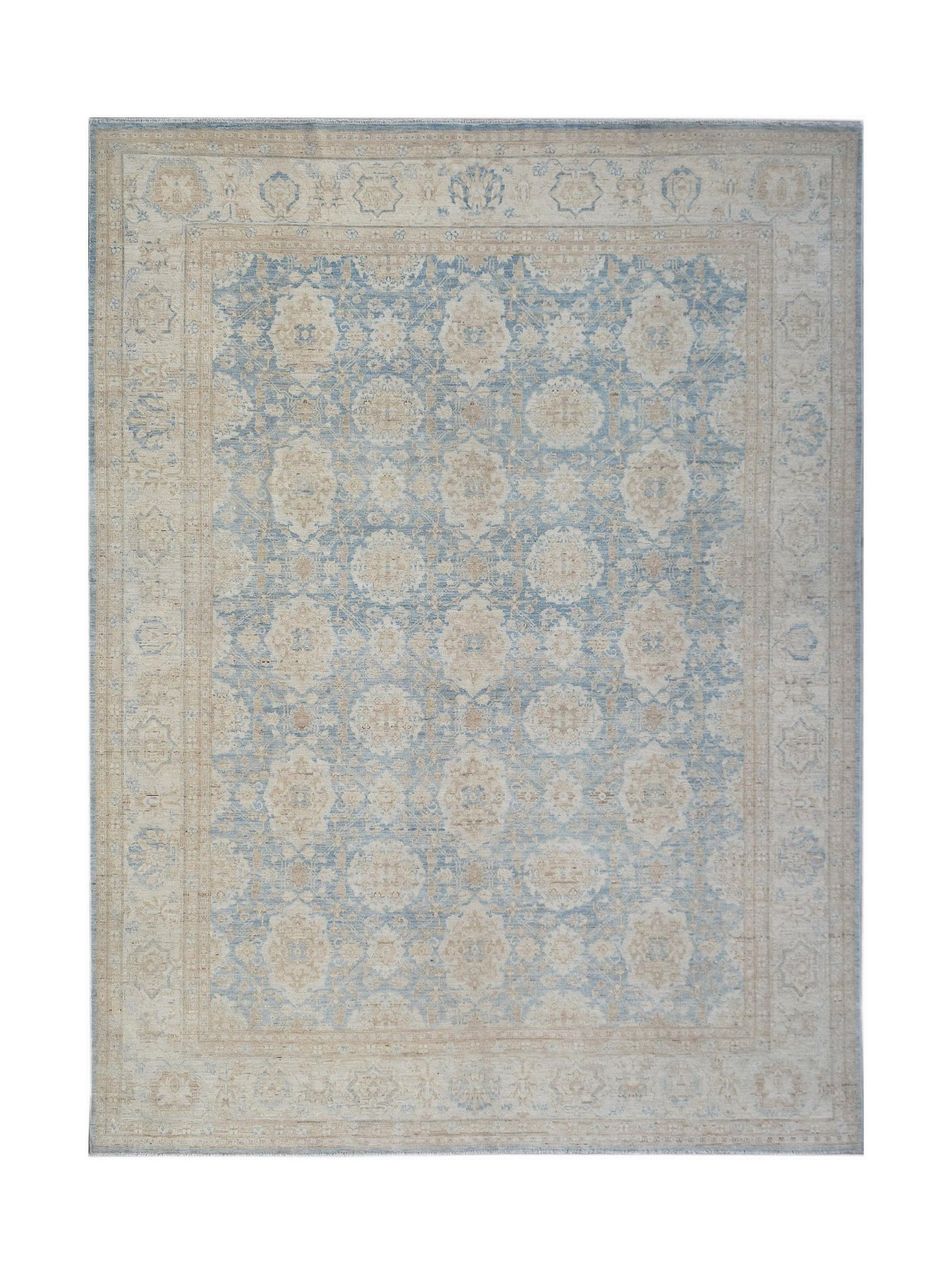 A rectangular Afghan Balkh rug featuring a traditional floral pattern in soft blue and beige tones.