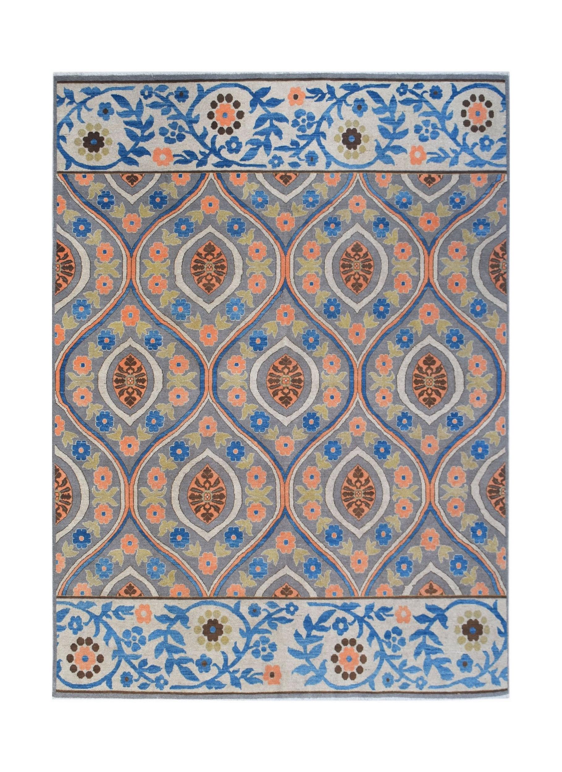 An Afghan Chobi rug featuring a repeating floral medallion pattern in blue, orange, and grey.