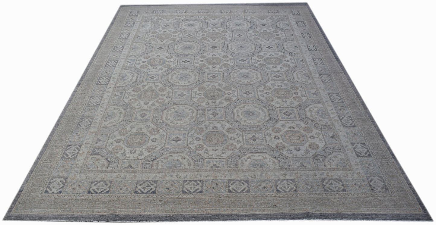 A rectangular Afghan Chobi rug featuring a traditional geometric pattern in muted earth tones.