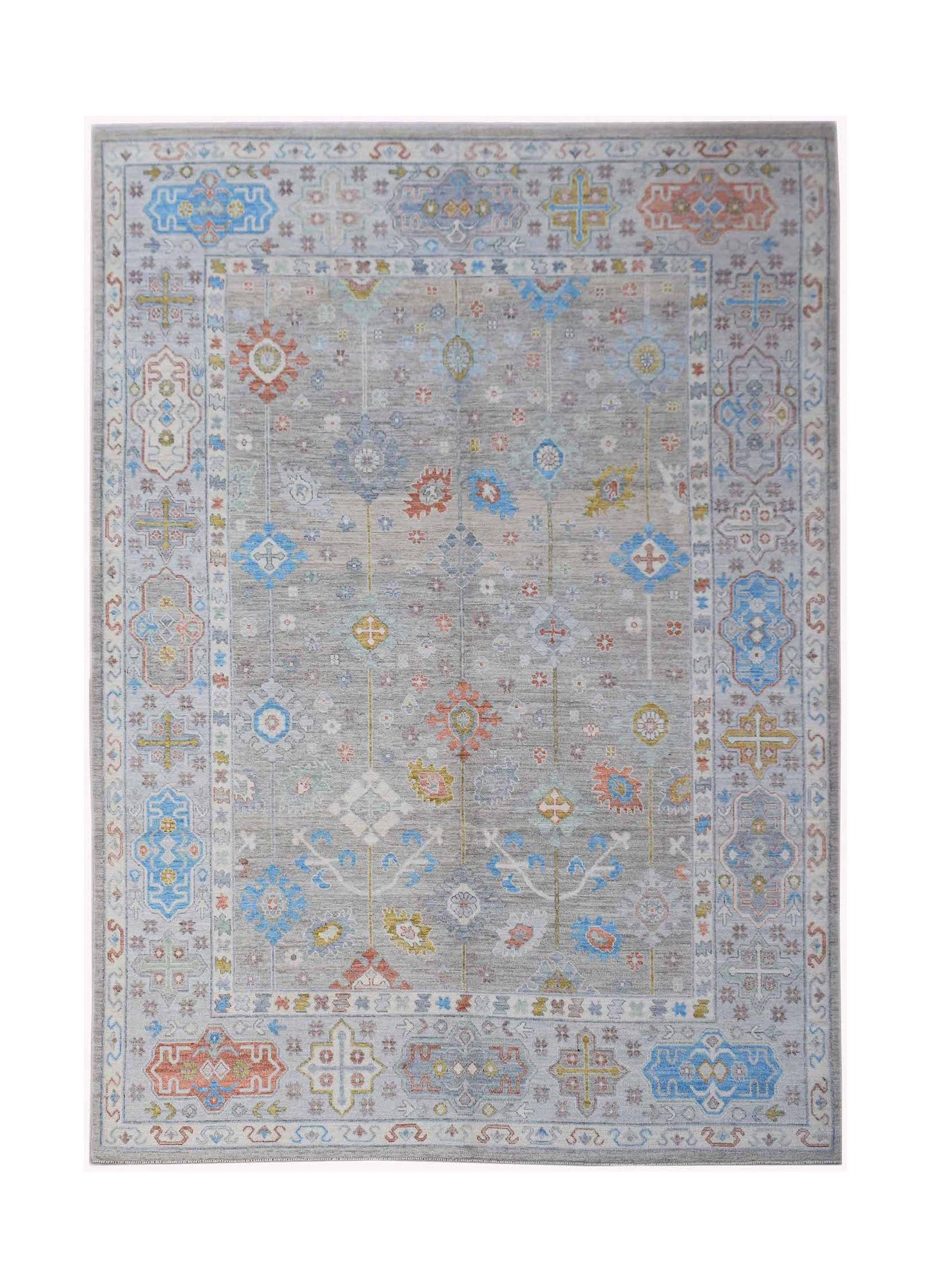 Handwoven Afghan Chobi rug featuring a grey field with colorful geometric and floral motifs.