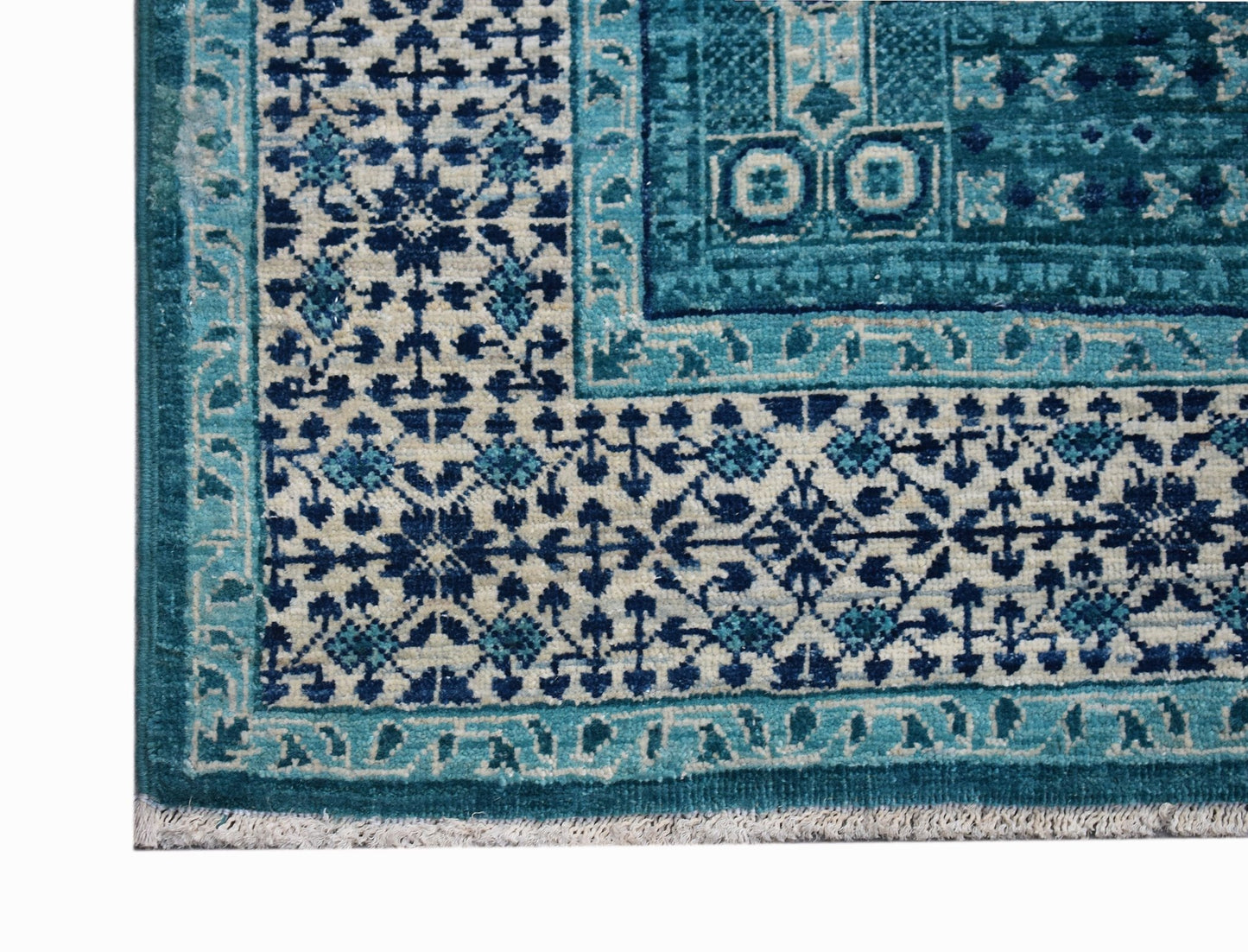 A handmade Afghan Balkh rug featuring a detailed blue and cream Mamluk geometric pattern.