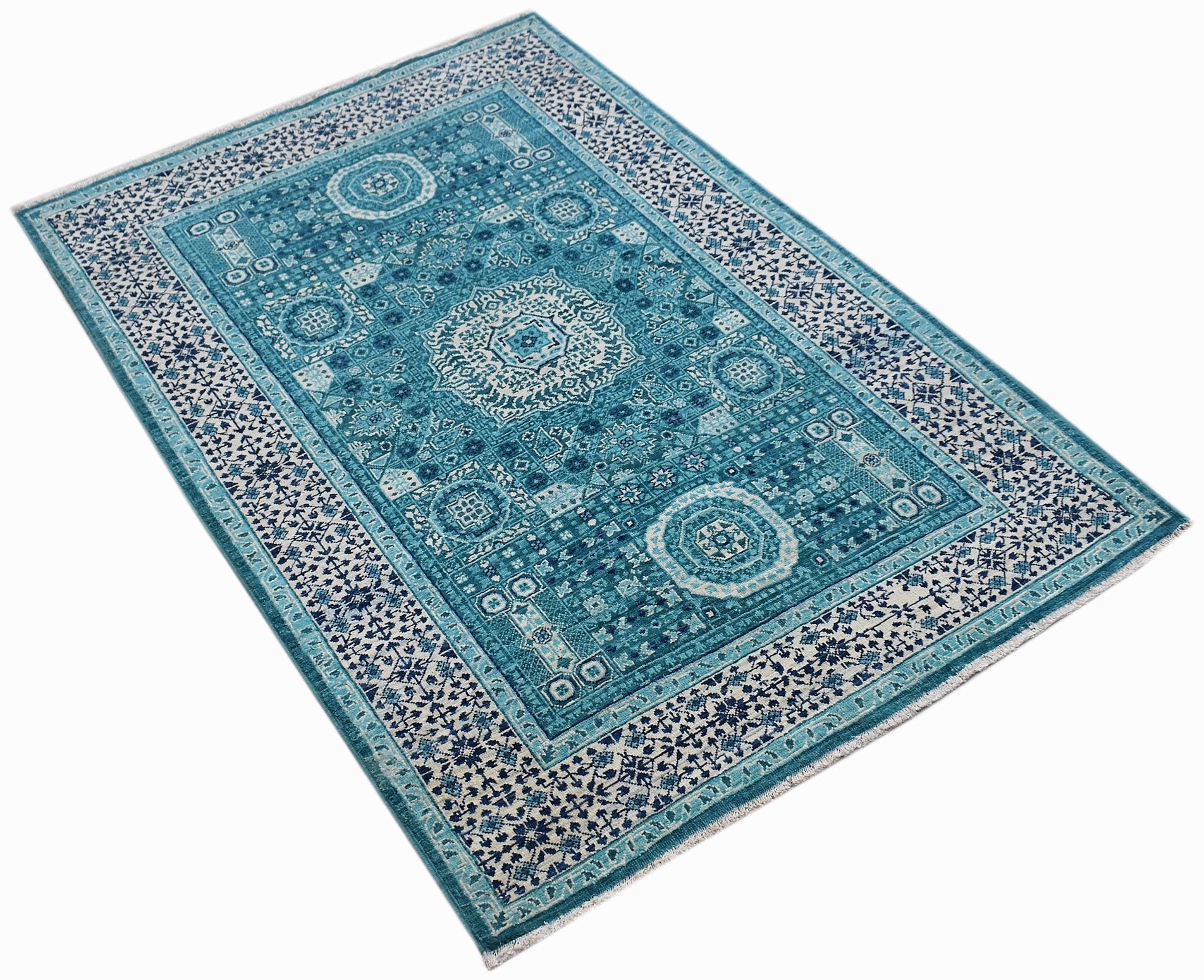 A rectangular, handwoven Afghan Balkh rug featuring a detailed blue and white Mamluk pattern.