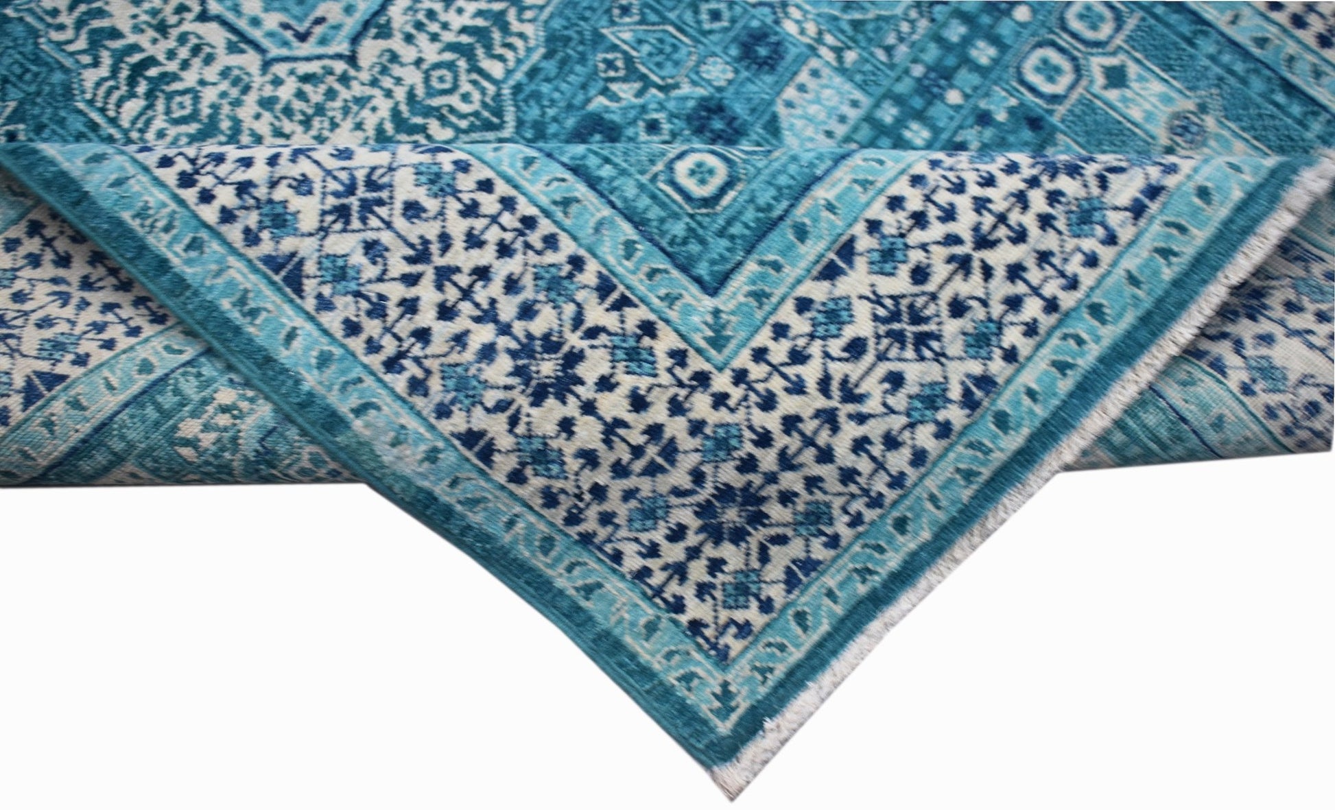 A handmade Afghan Balkh rug featuring a detailed blue and white Mamluk medallion pattern.