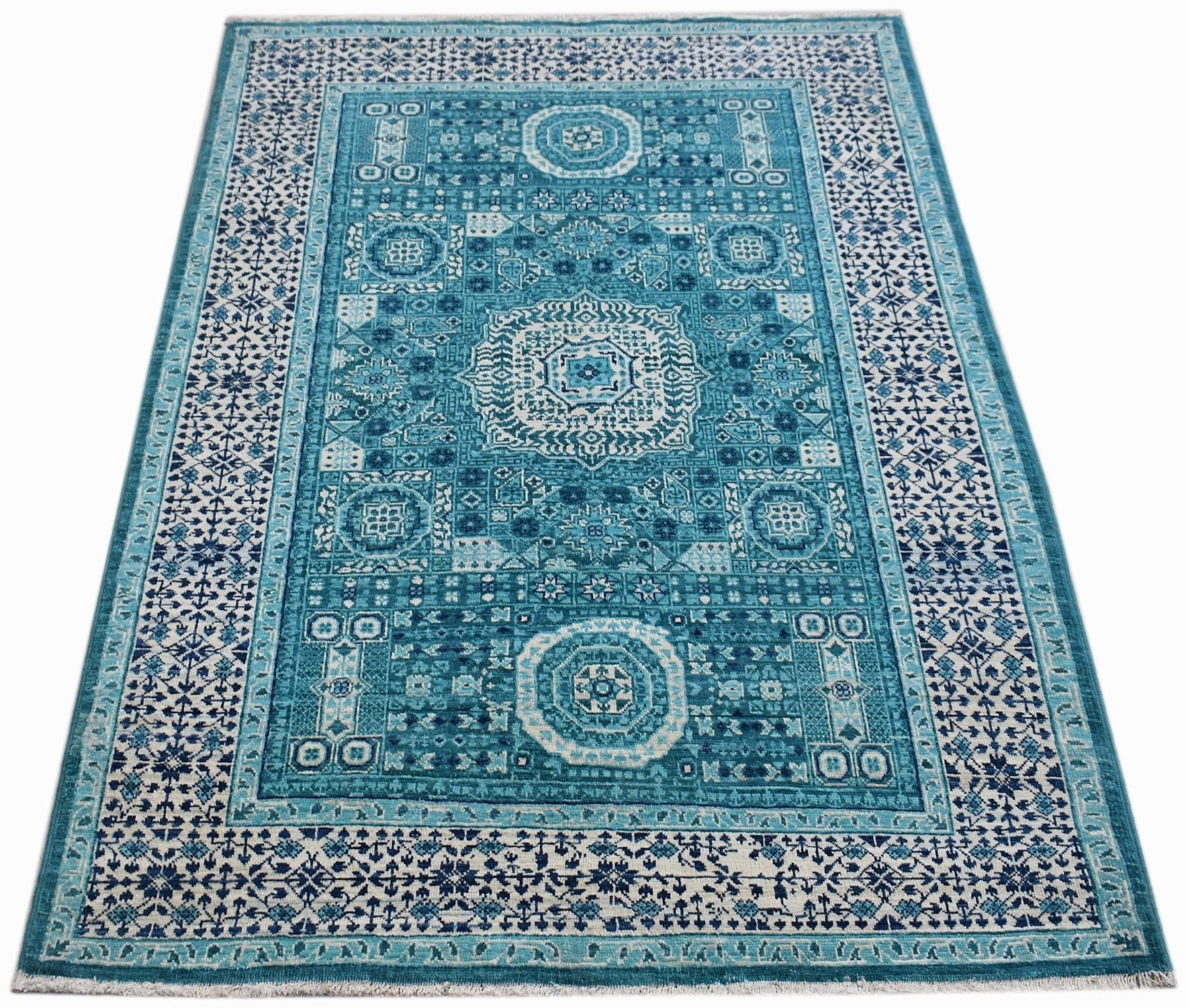 Handwoven Afghan Balkh rug featuring a detailed blue and white Mamluk medallion pattern.
