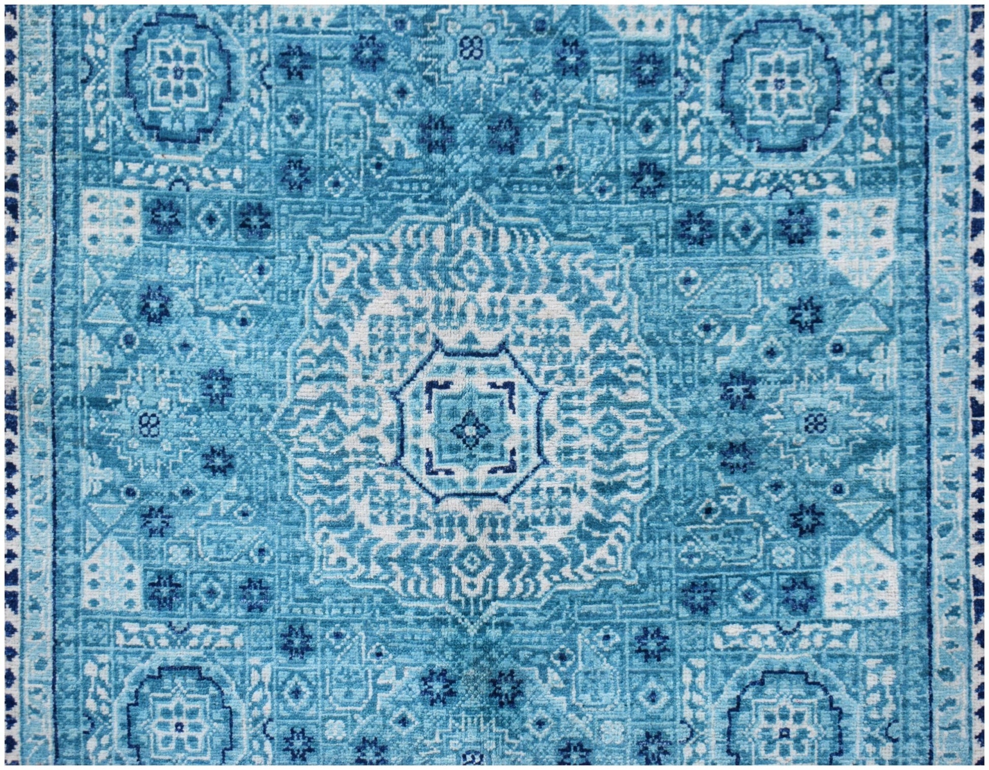 Handwoven Afghan Chobi rug featuring a detailed blue and white Mamluk medallion pattern.