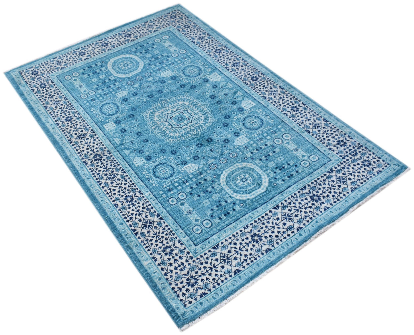A rectangular Afghan Chobi rug featuring a detailed blue and white Mamluk medallion pattern.