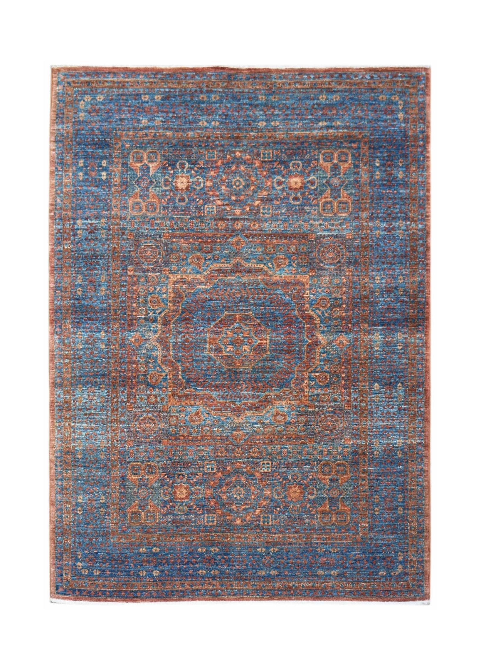 Handwoven Afghan Chobi rug featuring a traditional Mamluk medallion pattern in blue and rust tones.