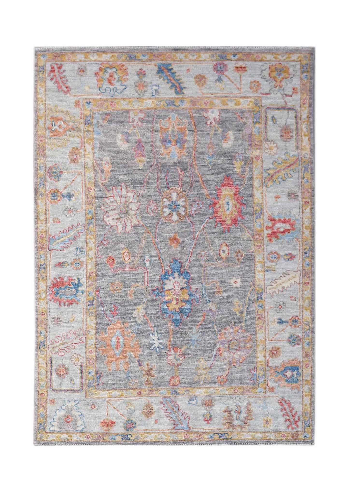 A handwoven transitional Oushak rug featuring a floral pattern in grey, blue, and orange tones.
