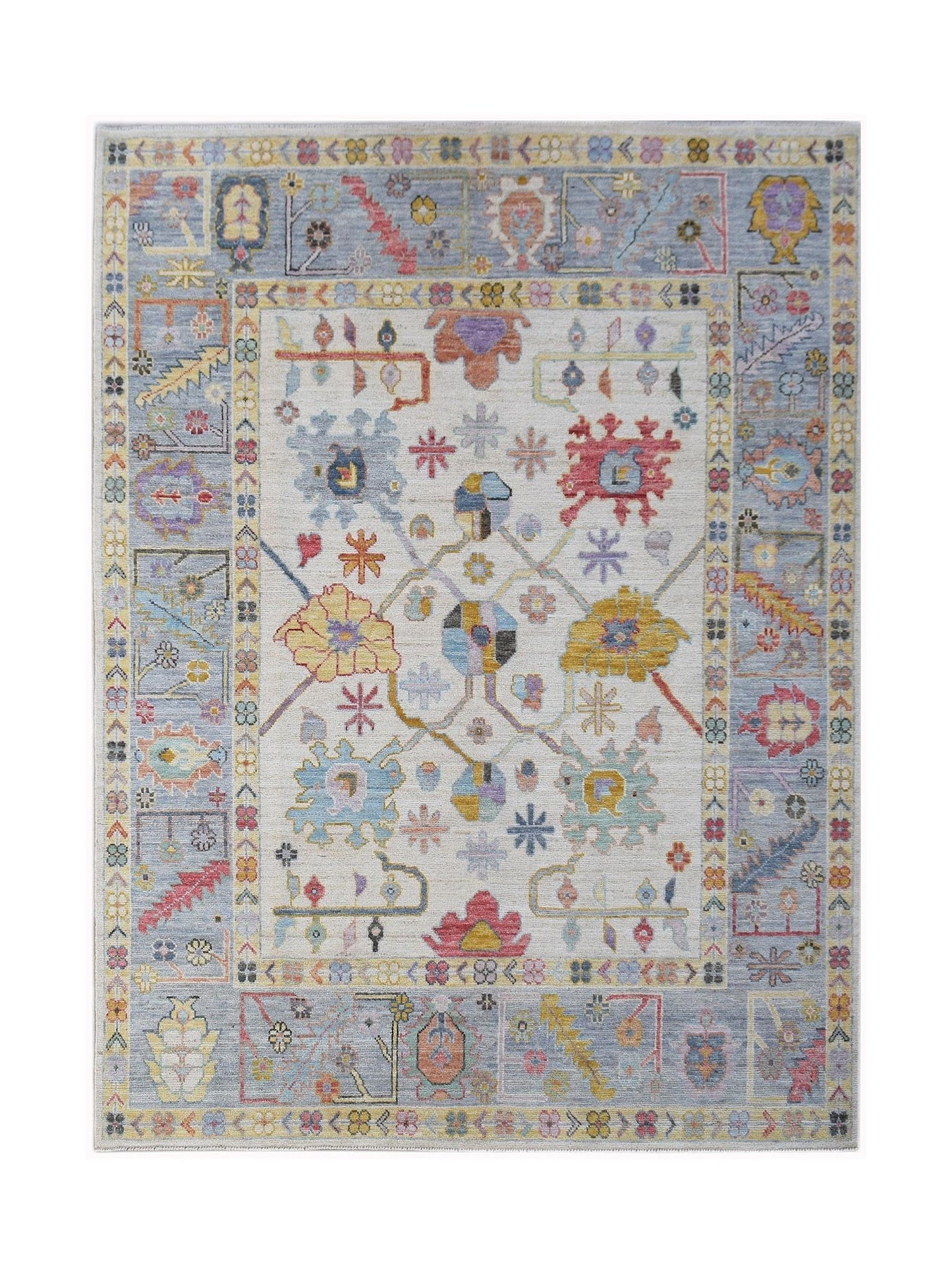 A transitional Oushak rug featuring a floral pattern in soft colors on a light cream background.