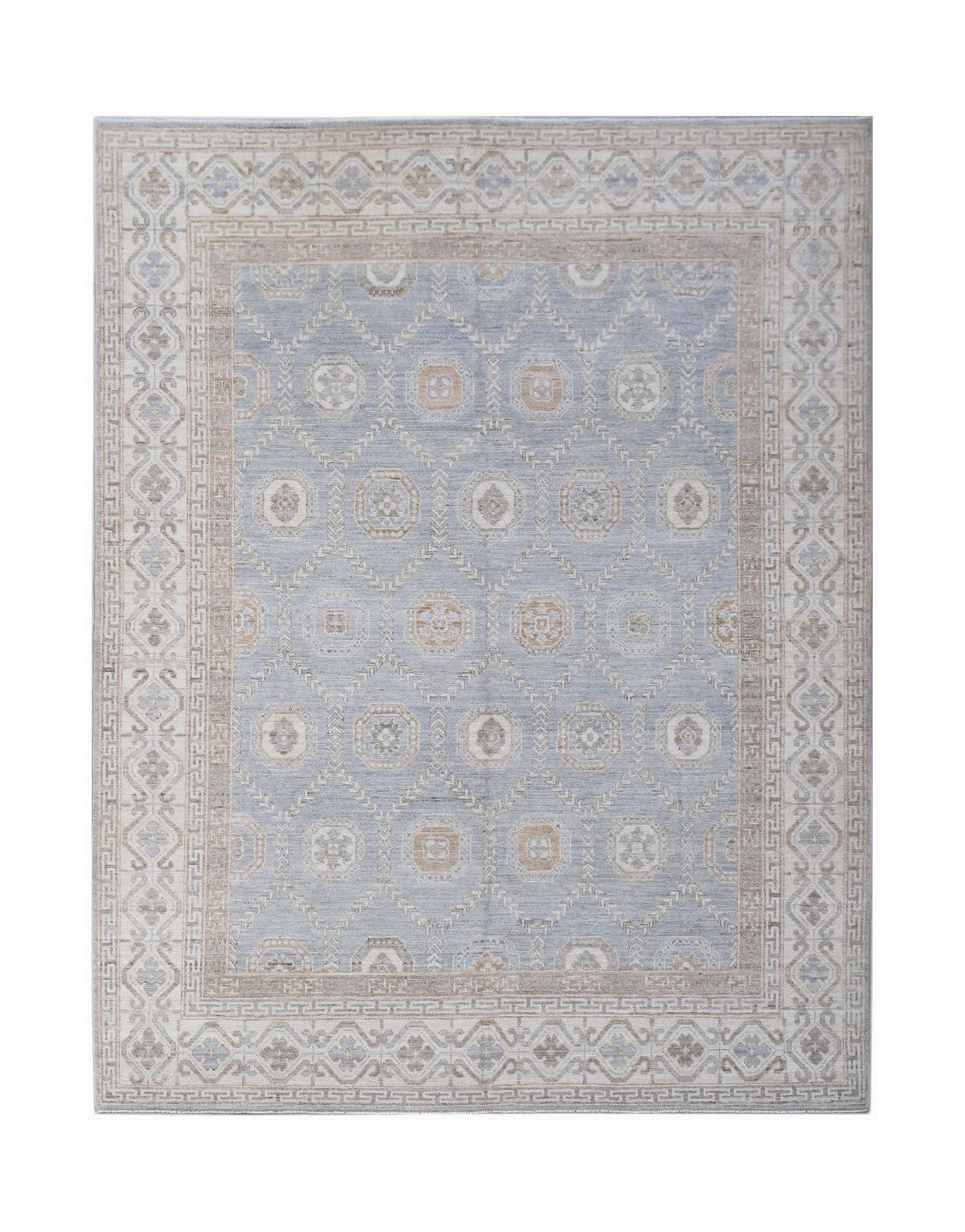 A handwoven transitional Oushak rug featuring a light blue field with a geometric floral pattern.