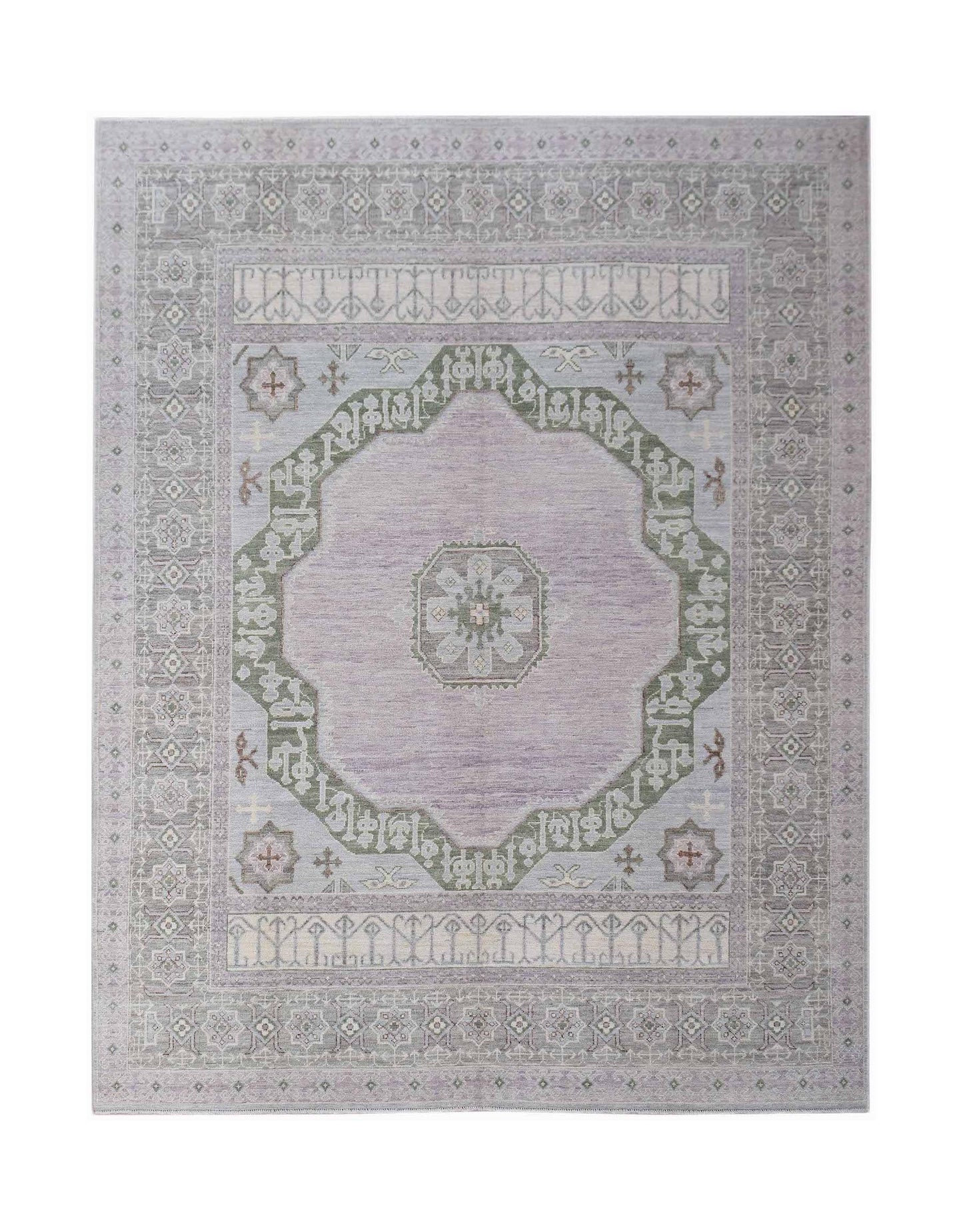 A handwoven transitional Oushak rug featuring a central medallion in soft lavender and sage green.