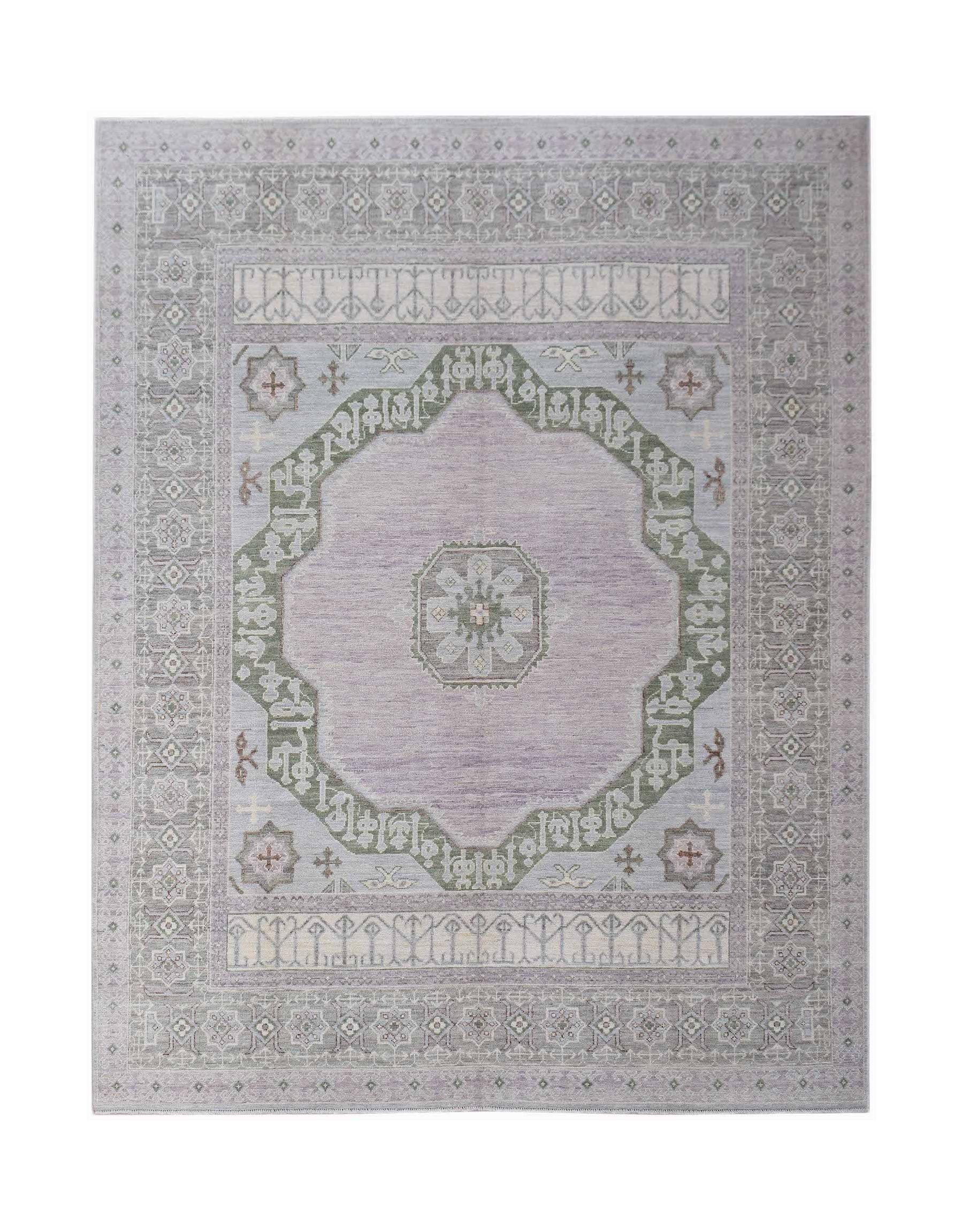 A handwoven transitional Oushak rug featuring a central medallion in soft lavender and sage green.