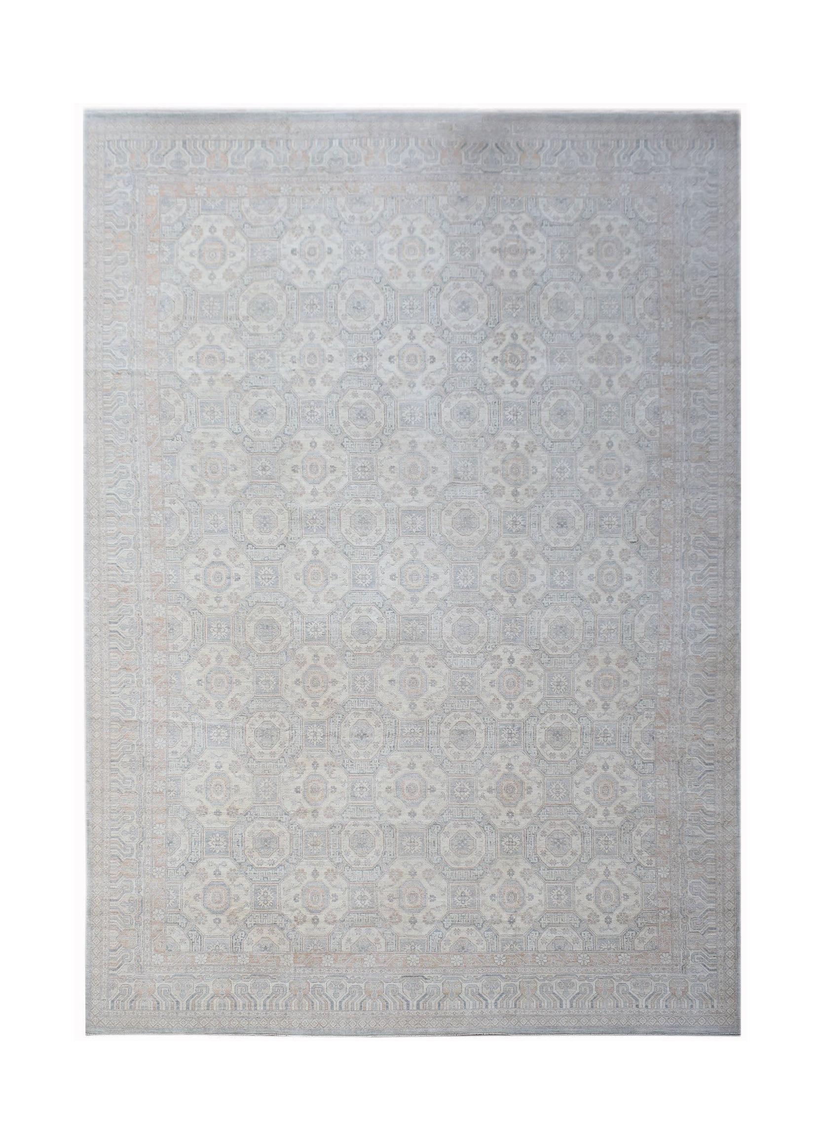 A handwoven transitional Oushak rug featuring a light grey floral pattern on a wool pile.