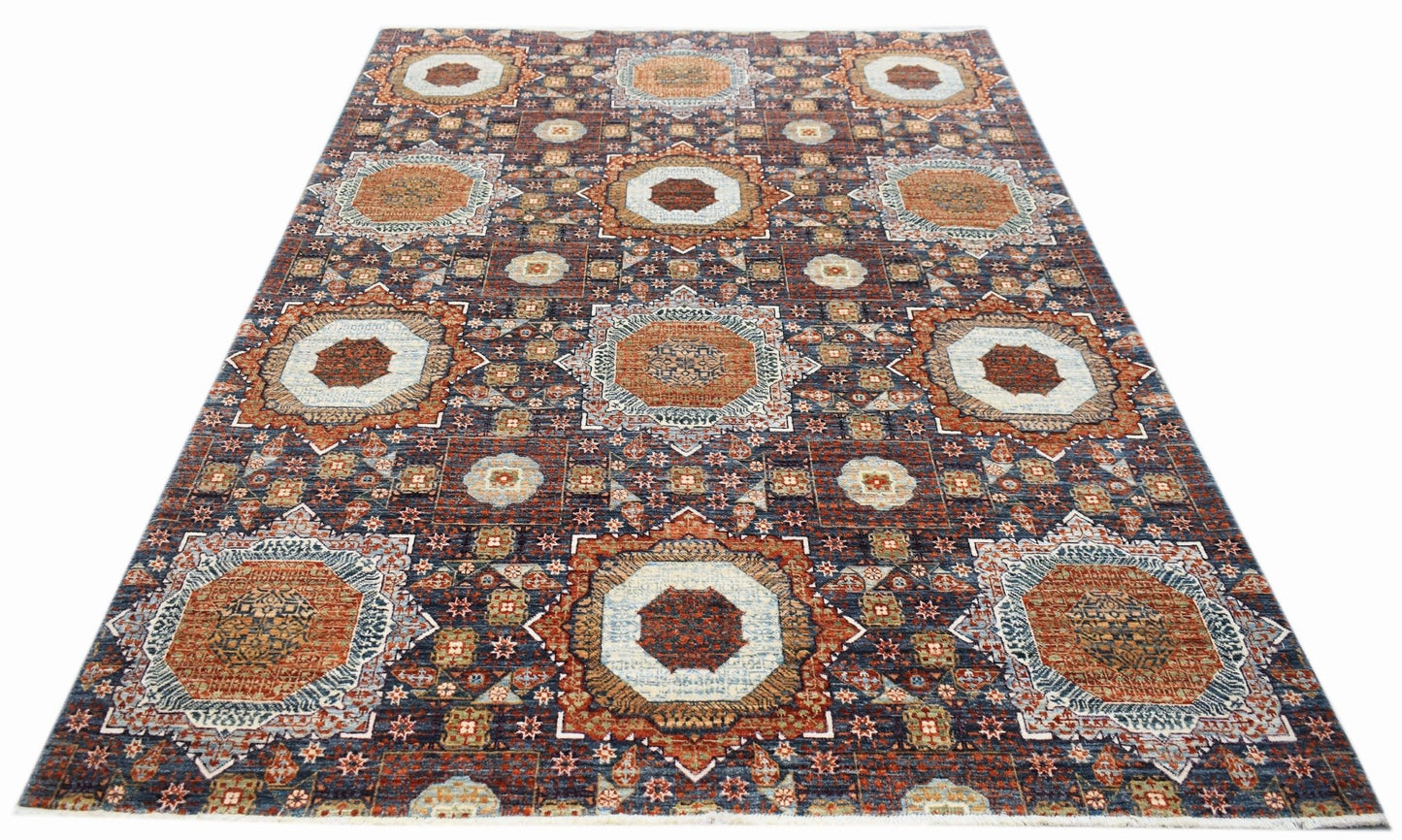 Handwoven Afghan Balkh rug featuring a traditional Mamluk medallion pattern in earthy tones.