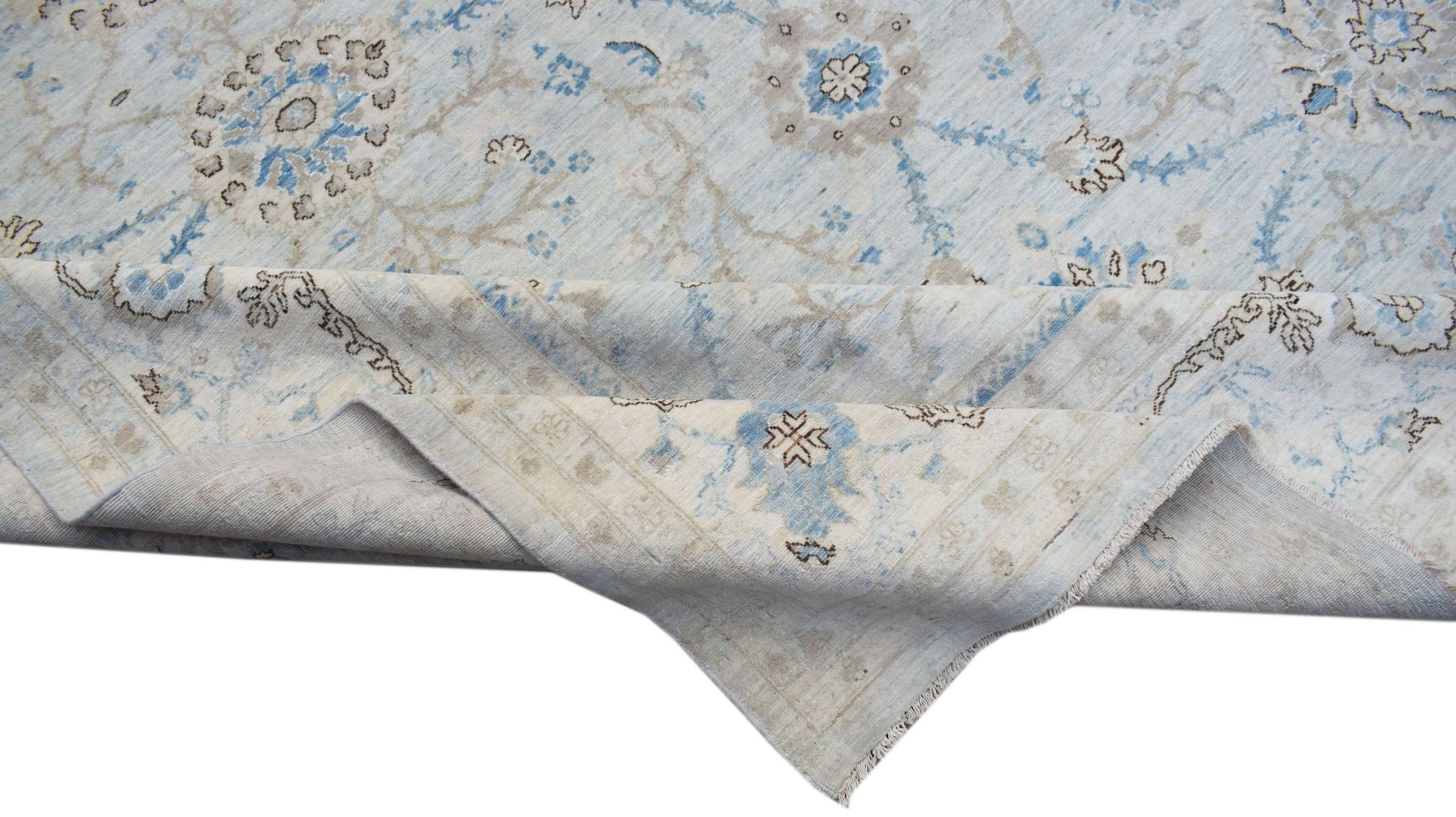 A handwoven Afghan Balkh rug featuring a traditional Mamluk medallion pattern in blue and beige.