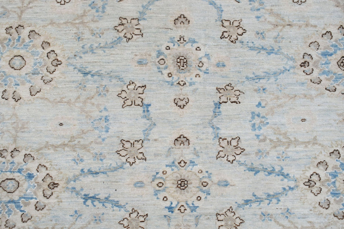 Handwoven Afghan Balkh rug featuring a traditional Mamluk medallion pattern in blue and beige.