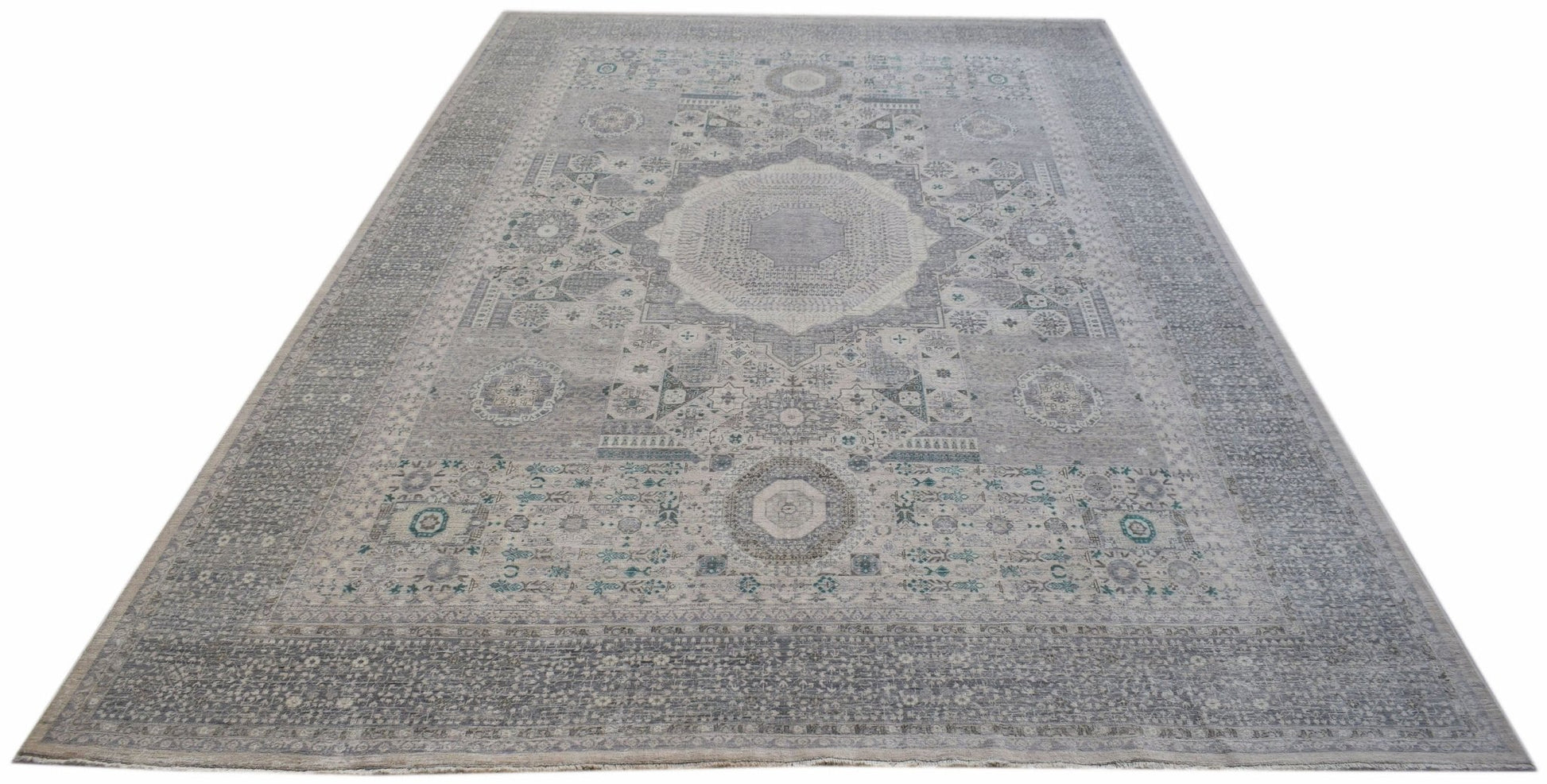 A handwoven Afghan Balkh rug featuring a traditional grey Mamluk medallion pattern.