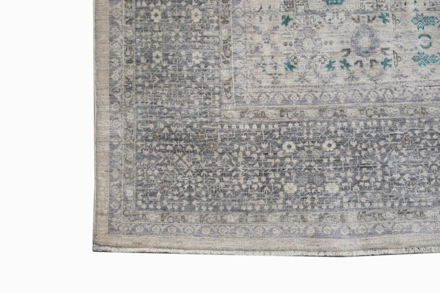 A handwoven Afghan Balkh rug featuring a detailed Mamluk pattern in shades of grey and blue.
