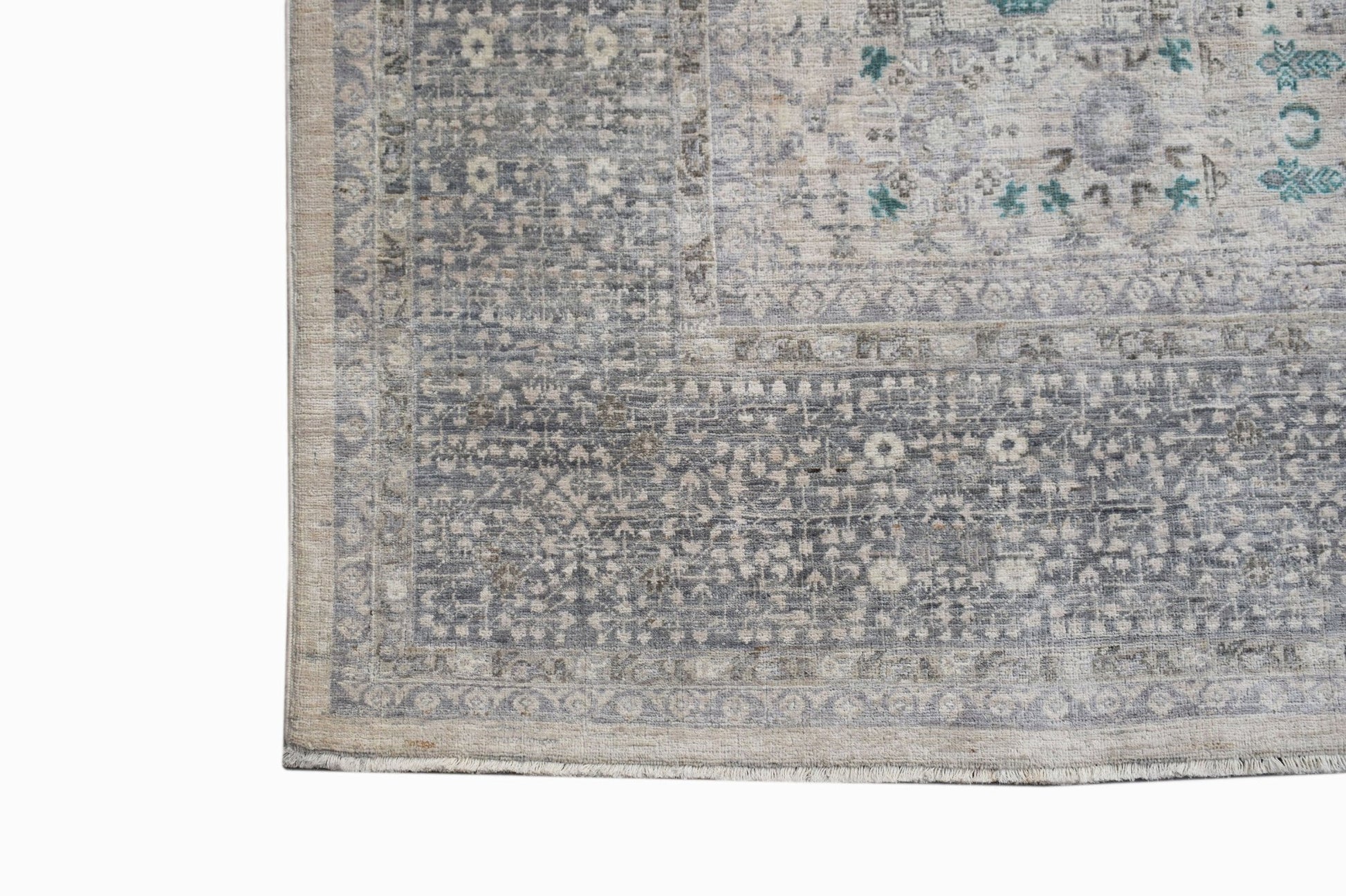 A handwoven Afghan Balkh rug featuring a detailed Mamluk pattern in shades of grey and blue.