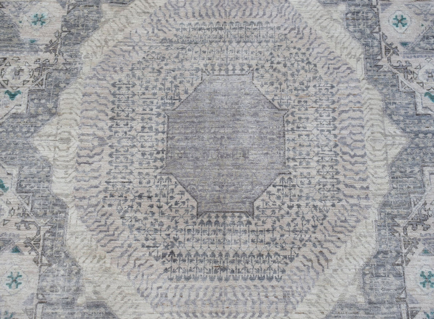 Handwoven Afghan Balkh rug featuring a detailed grey and cream Mamluk medallion pattern.