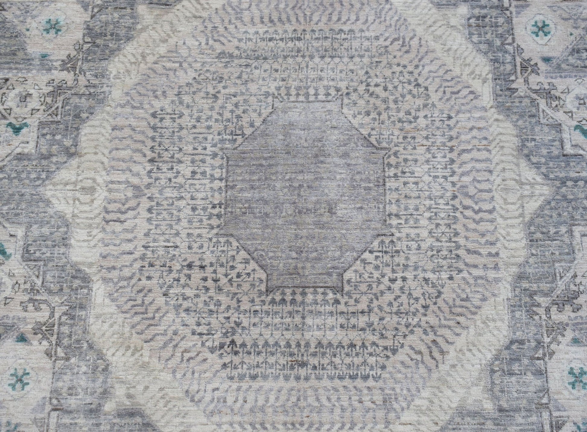 Handwoven Afghan Balkh rug featuring a detailed grey and cream Mamluk medallion pattern.