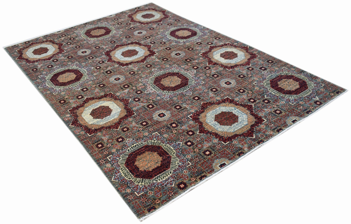 Handwoven Afghan Balkh rug featuring a traditional Mamluk medallion pattern in earthy tones.