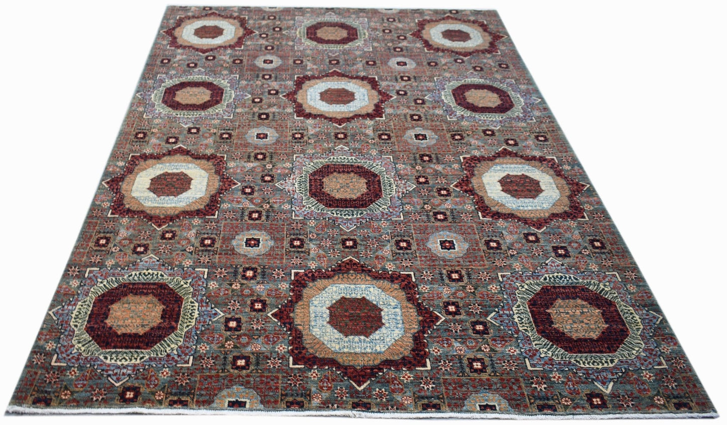 Handwoven Afghan Balkh rug featuring a traditional Mamluk medallion pattern in earthy tones.