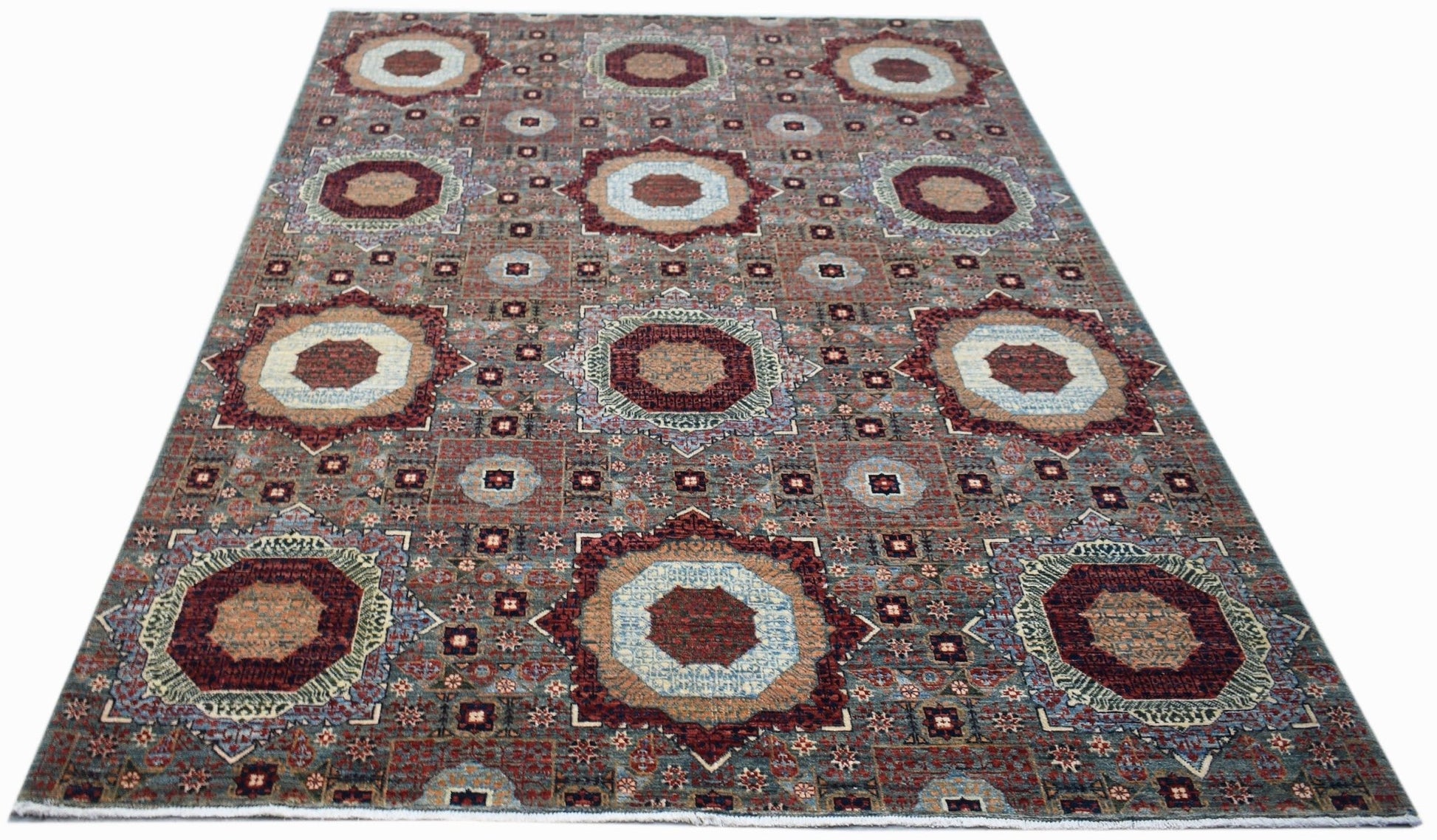 Handwoven Afghan Balkh rug featuring a traditional Mamluk medallion pattern in earthy tones.
