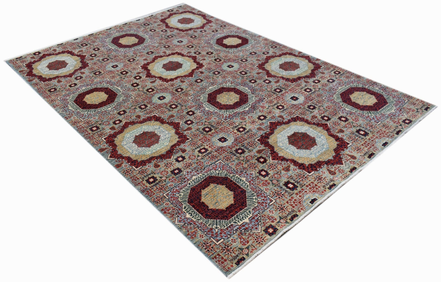 Handwoven Afghan Balkh rug featuring a traditional Mamluk medallion pattern in earthy tones.