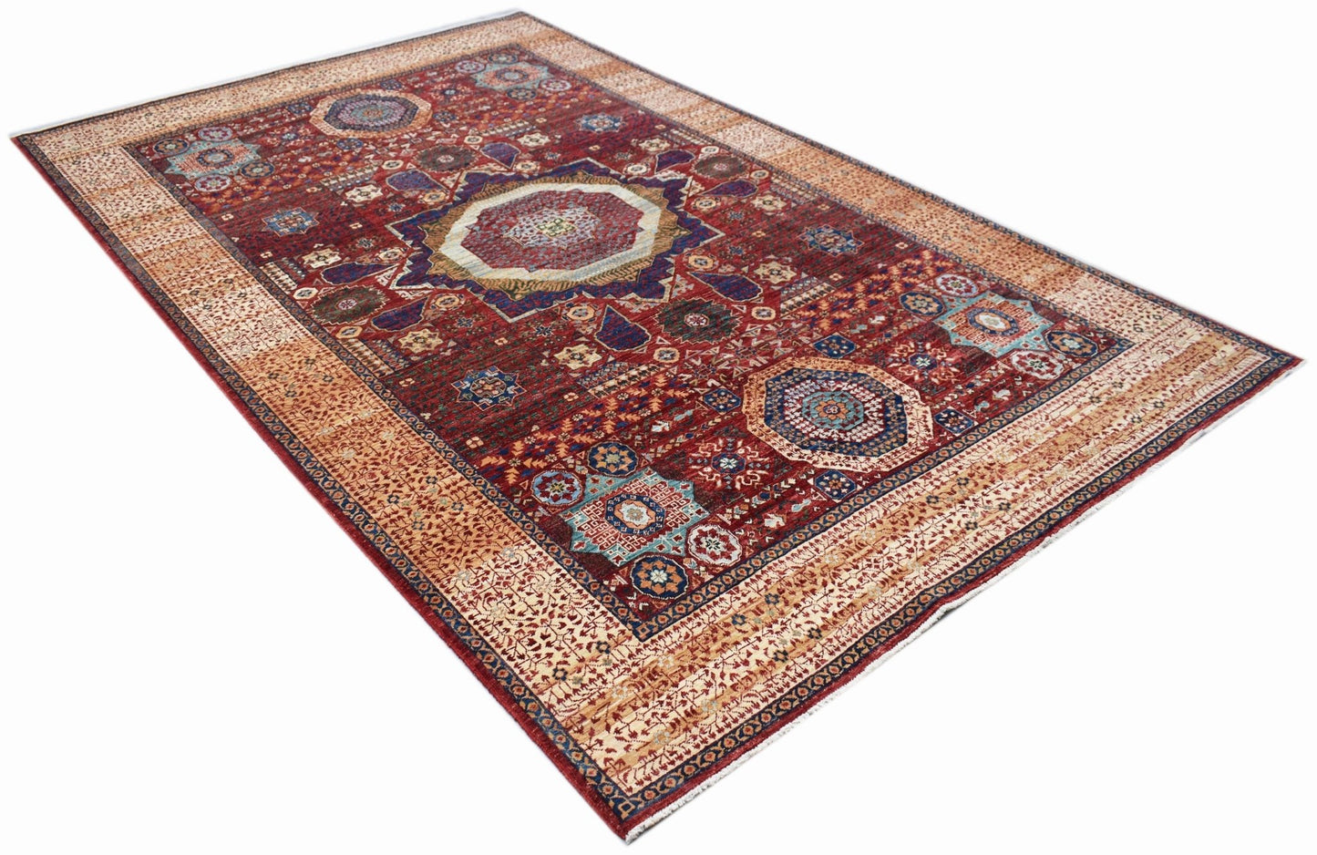 Handwoven Afghan Balkh rug featuring a traditional Mamluk medallion pattern in red and beige tones.