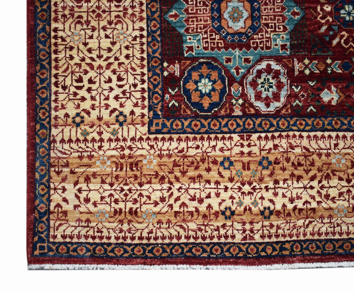 A handmade Afghan Balkh rug featuring a detailed Mamluk medallion pattern in red, blue, and tan.