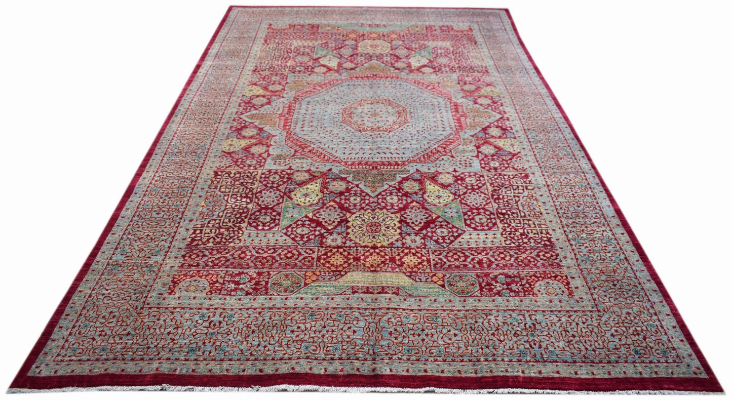A rectangular, handwoven Afghan Balkh rug featuring a detailed red and blue Mamluk medallion design.