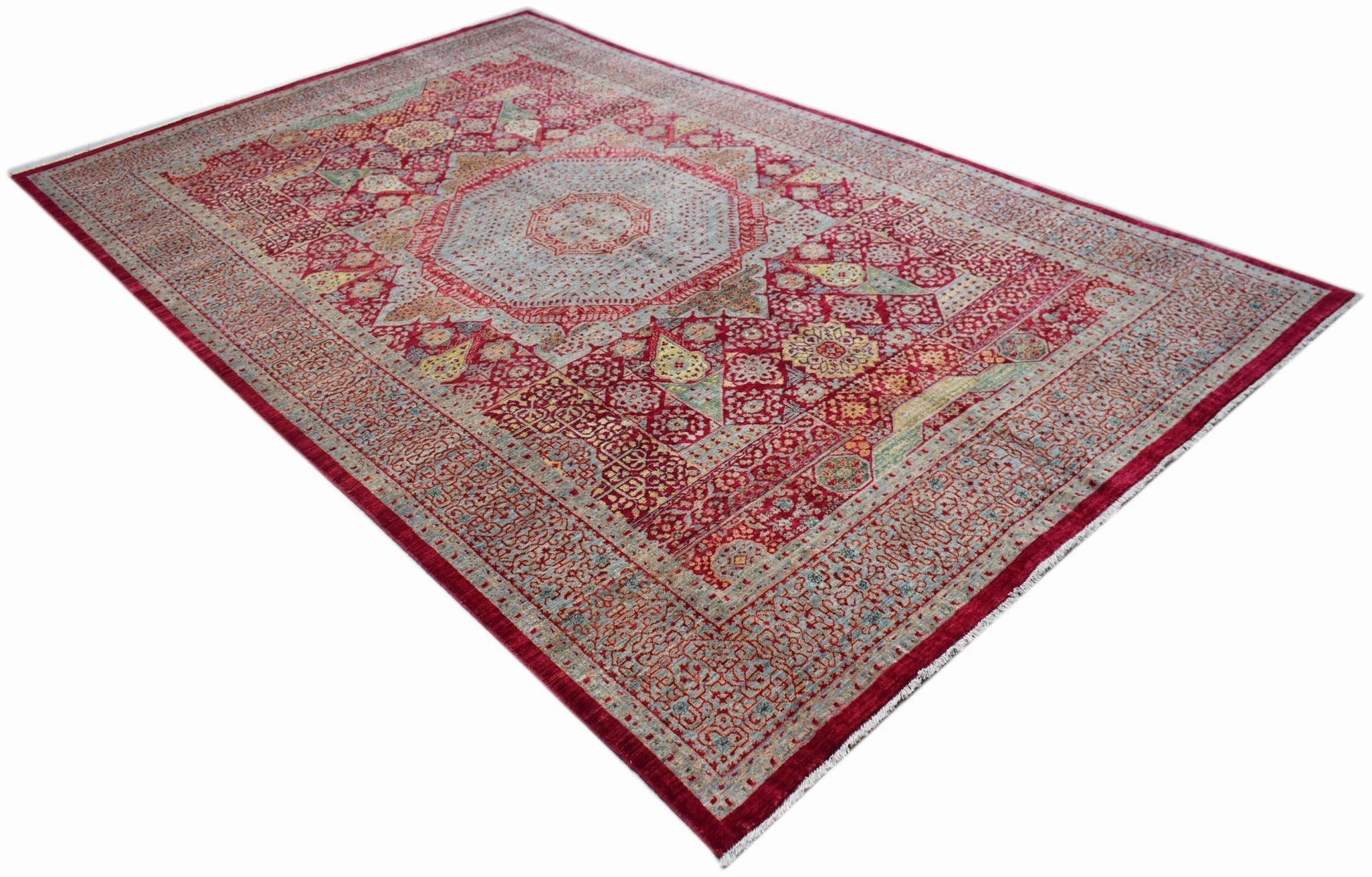 Handwoven Afghan Balkh rug featuring a traditional red and blue Mamluk medallion pattern.