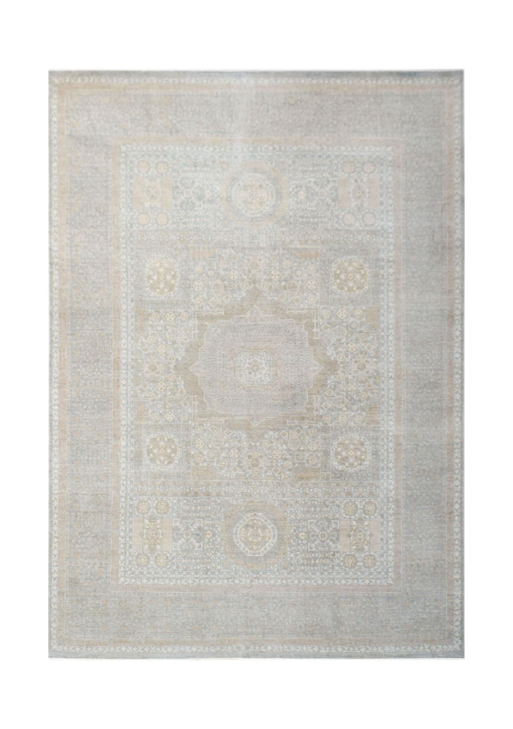 A handwoven Afghan Balkh rug featuring a traditional medallion pattern in soft neutral tones.
